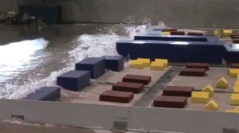 Tsunami Waves Amplified by Buildings .